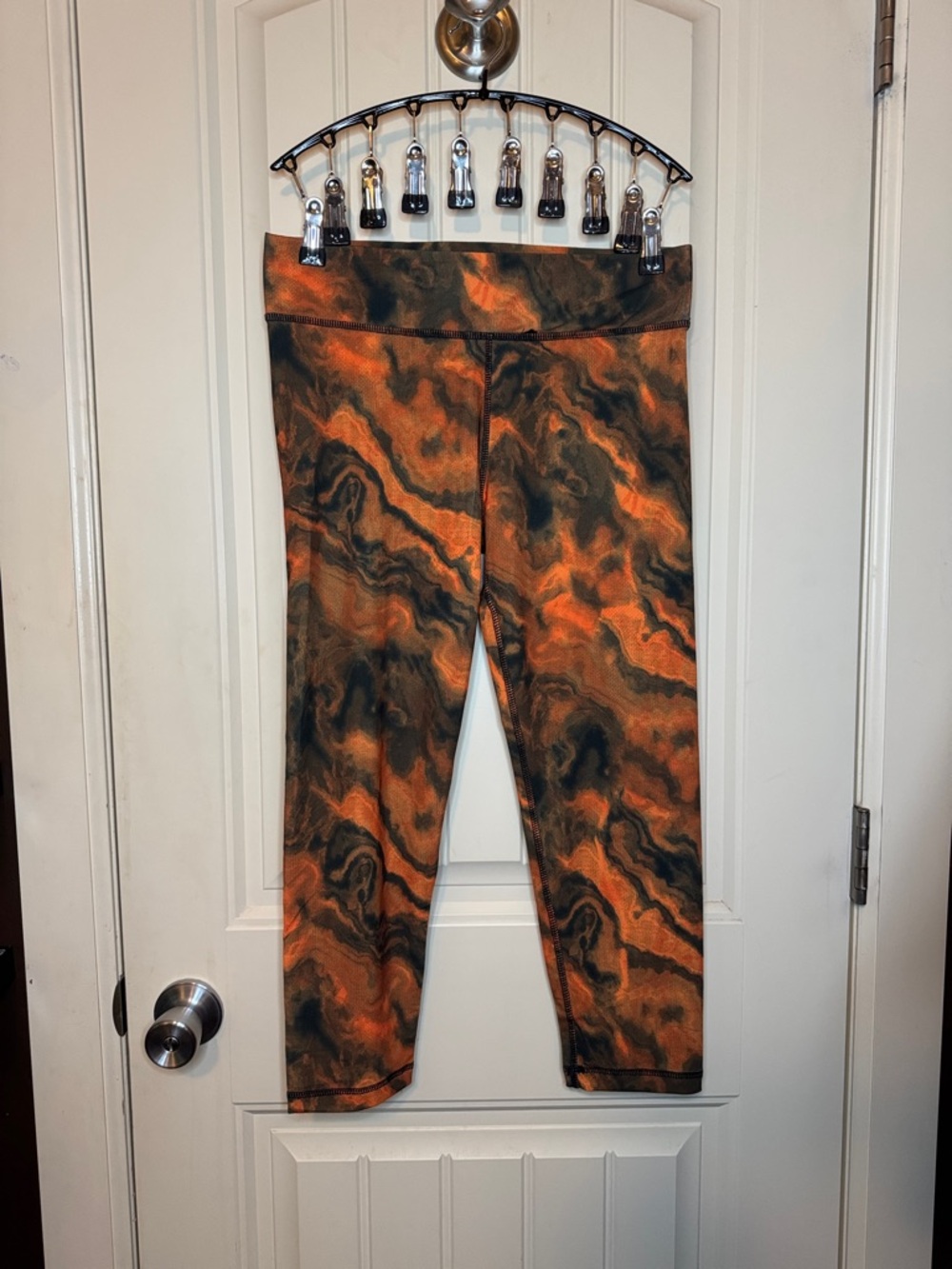 Velocity Woman’s Size M Orange Marble-Print Leggings